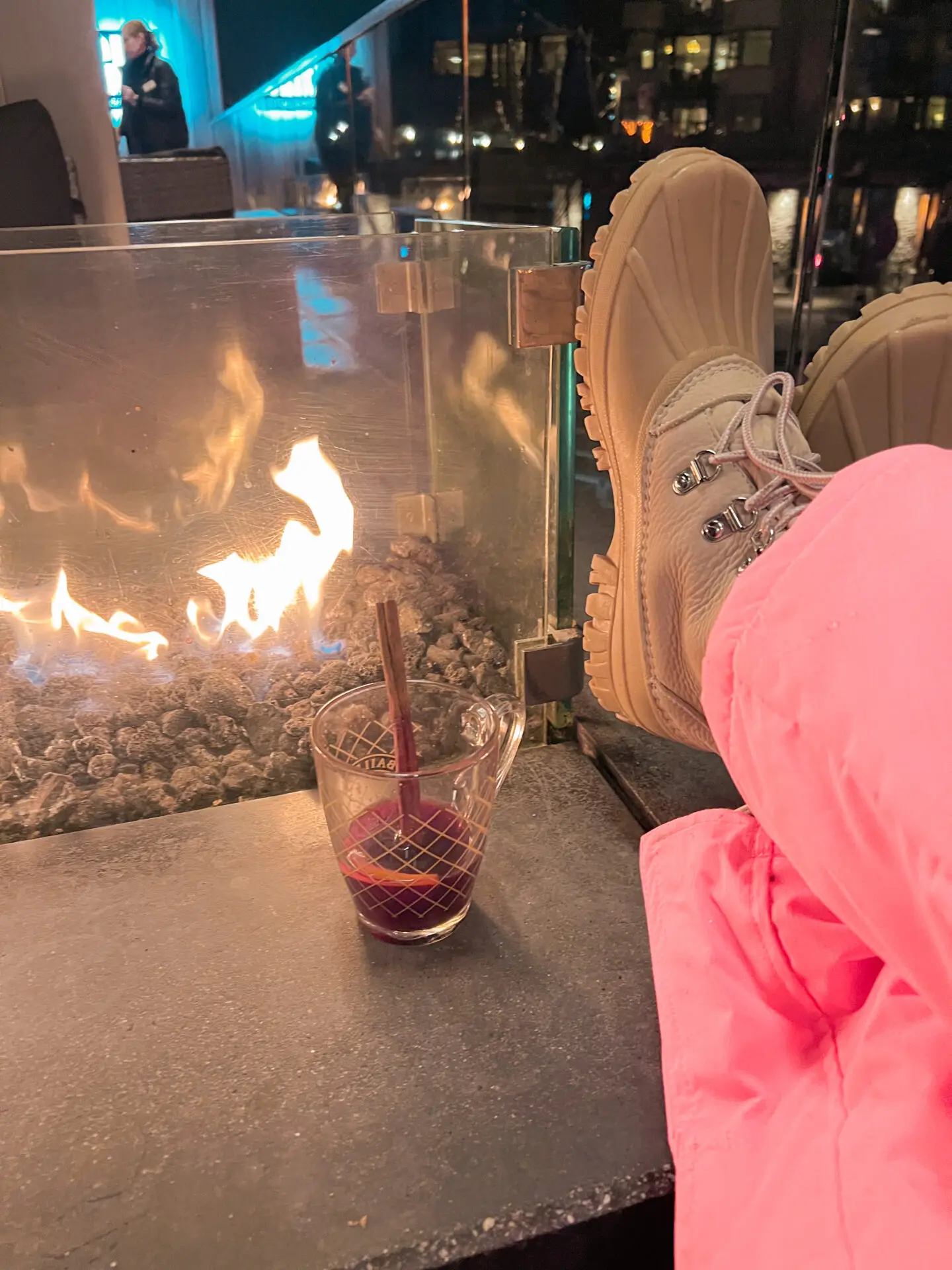 People raising glasses for a group toast at Garibaldi Lift Company in Whistler.
