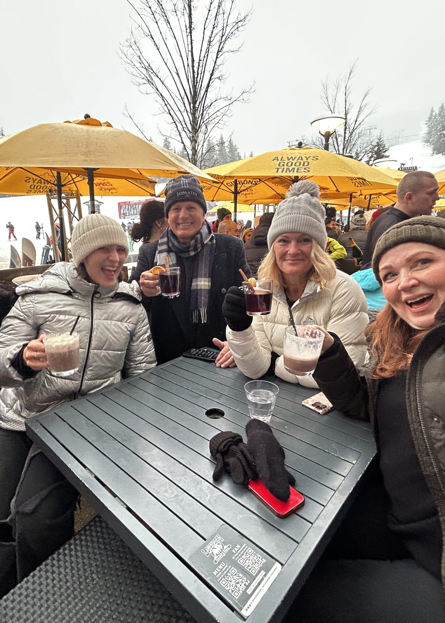 Après-ski crowd with mulled wine and music at The Longhorn Saloon in Whistler Village.