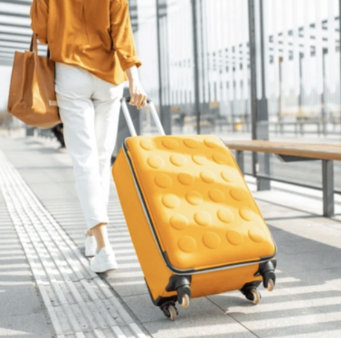 Woman at airport with luggage