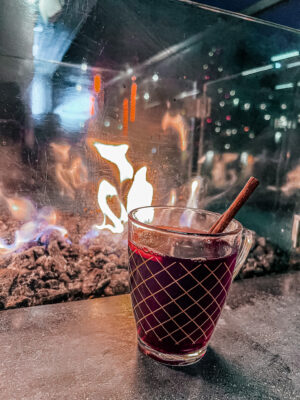 Mulled wine in front of an open fire.