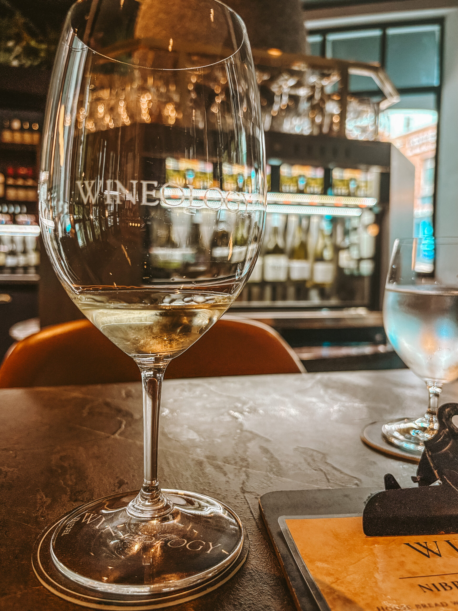 A tasting glass of riesling at wineoloy in Brisbane