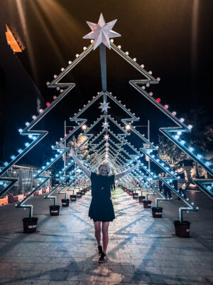 Nicole the influencer surrounded by christmas lights in perth